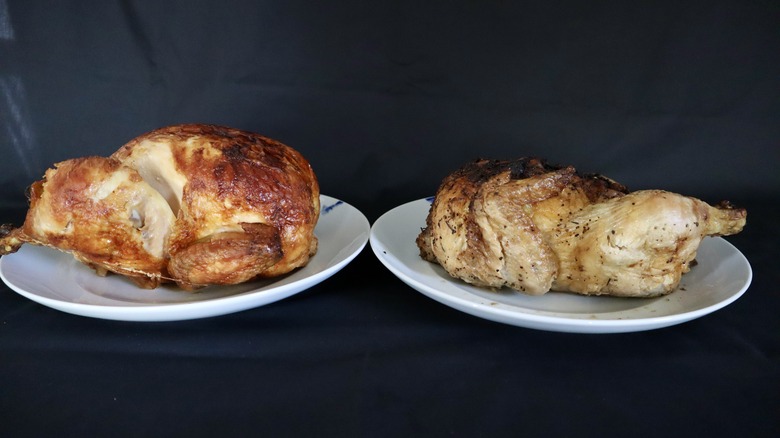 two rotisserie chickens on plates