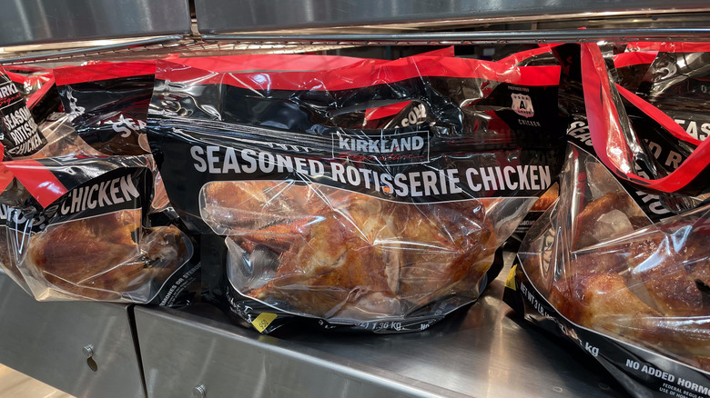 shelf of Costco rotisserie chickens