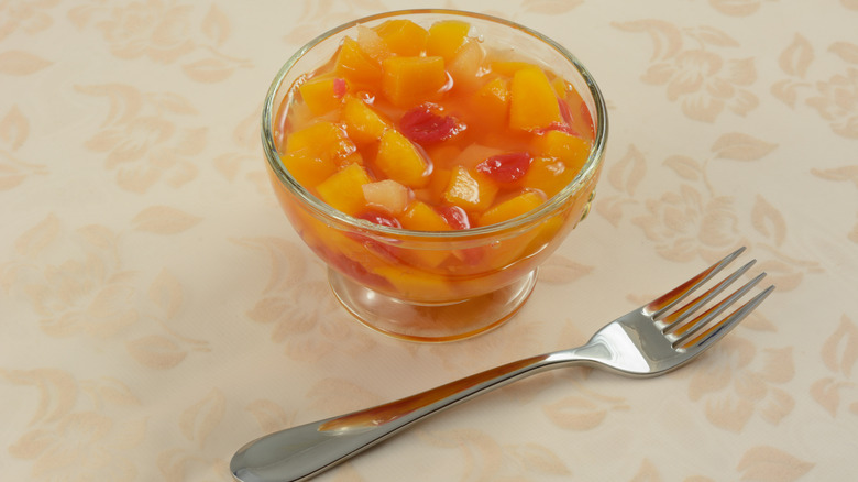 open fruit cup with fork