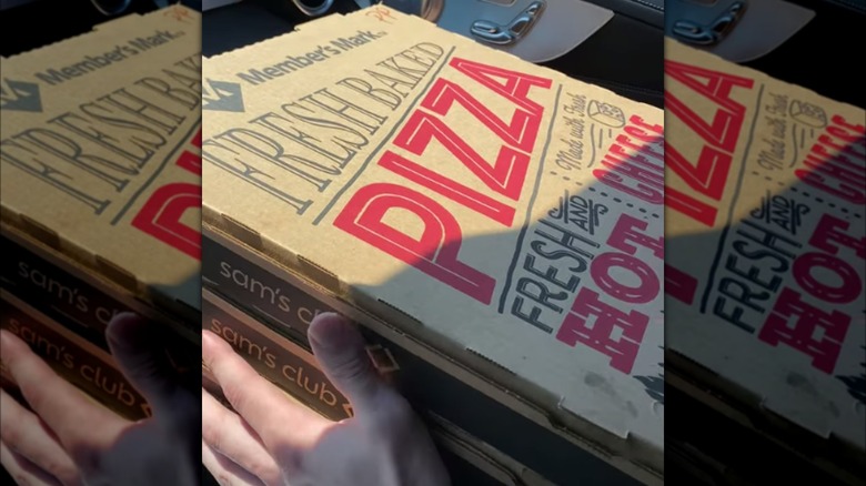 Stacked Member's Mark pizza boxes