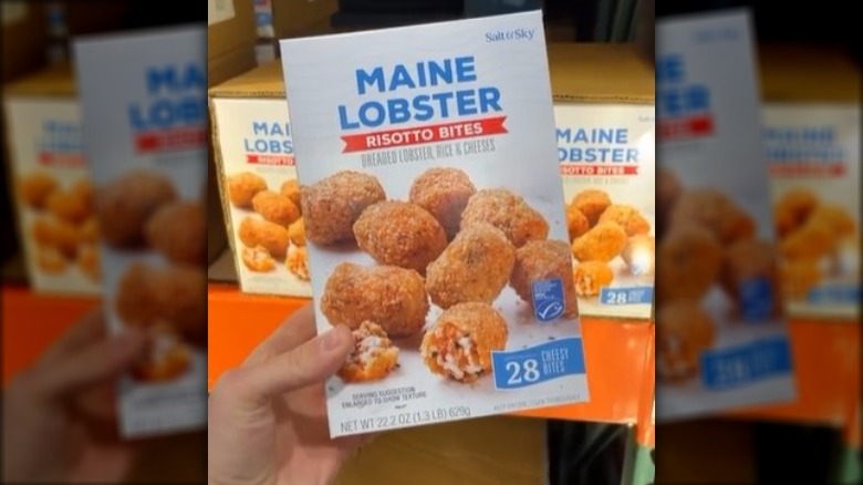 Person holding a box of Costco's Maine Lobster Risotto Bites