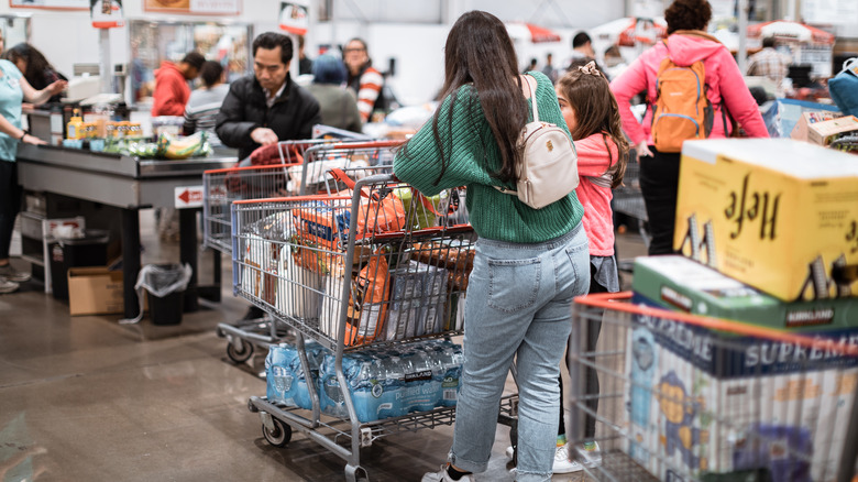 costco shoppers in checkout line