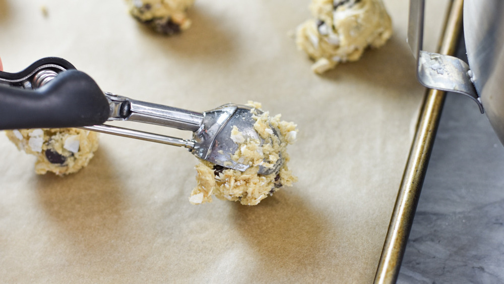 cookie dough rounds on a baking sheet