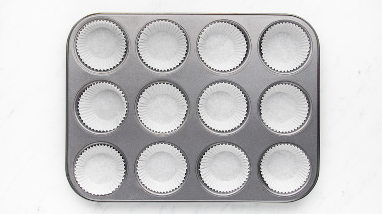 Muffin pan filled with muffin liners