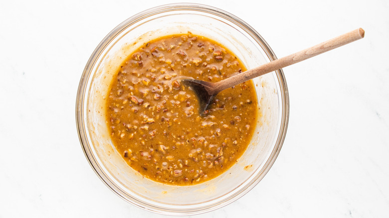 Pecan pie muffin batter in mixing bowl