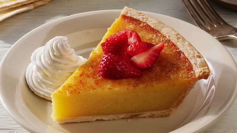 buttermilk pie with strawberries and whipped cream