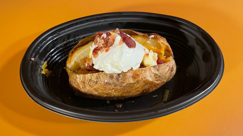 loaded baked potato on plate