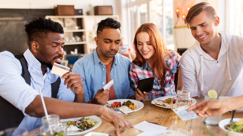 table of friends eating food