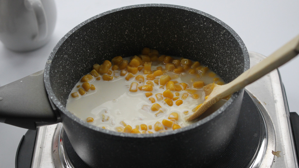 creamed corn cooking in pot