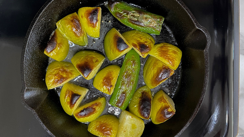 Browned green vegetables in pan