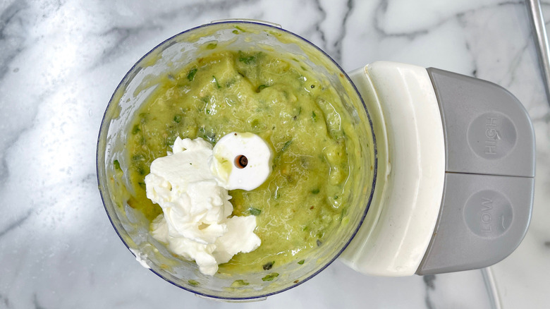 Salsa verde with sour cream in blender