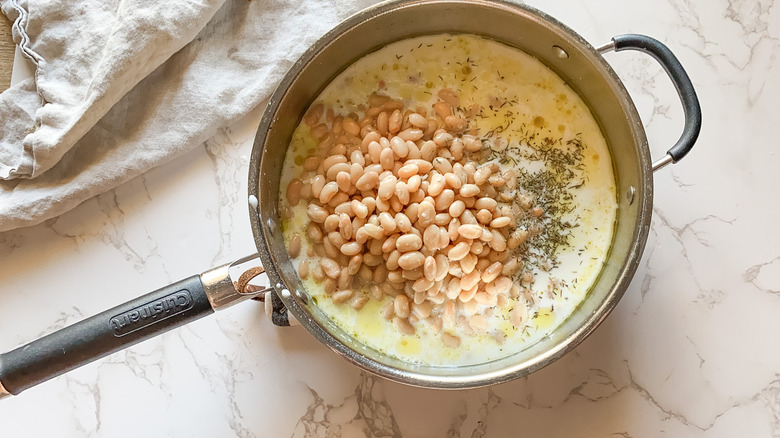 beans in pan with milk