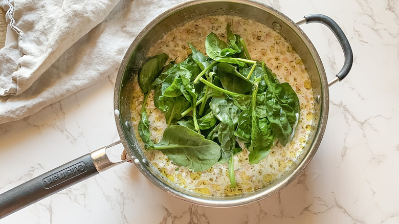 spinach added to creamy concoction