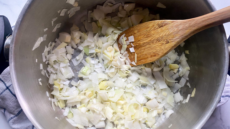 garlic and leeks cooking in pot