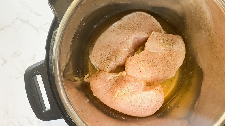 Chicken breasts inside an Instant Pot.