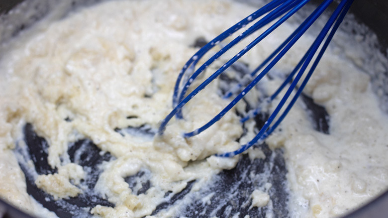 whisking butter and flower mix