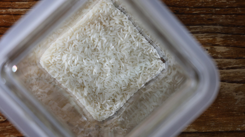 glass container with rice in it