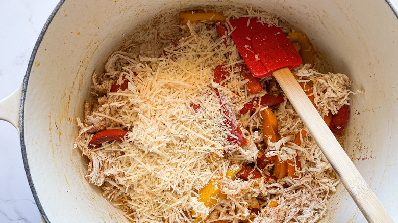 Peppers and chicken topped with Parmesan and spices