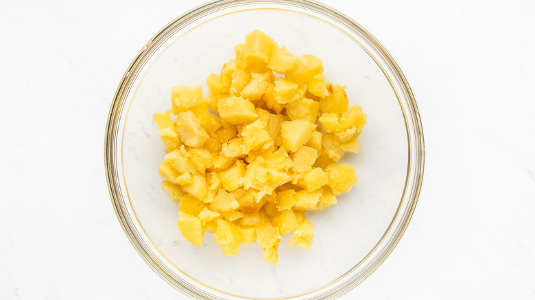 chopped baked potato in mixing bowl