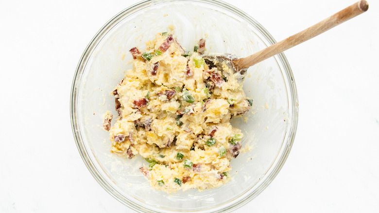 baked potato salad in mixing bowl