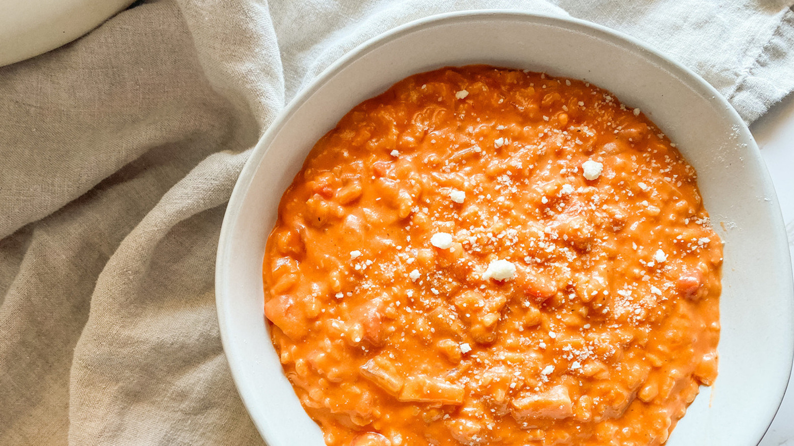 https://www.mashed.com/img/gallery/creamy-tomato-risotto-recipe/l-intro-1626817054.jpg