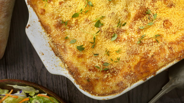 casserole dish filled with potatoes 