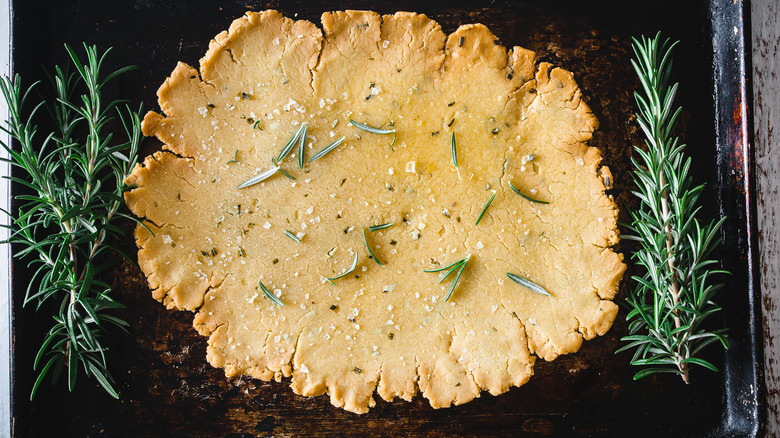 rosemary flatbread on baking sheet