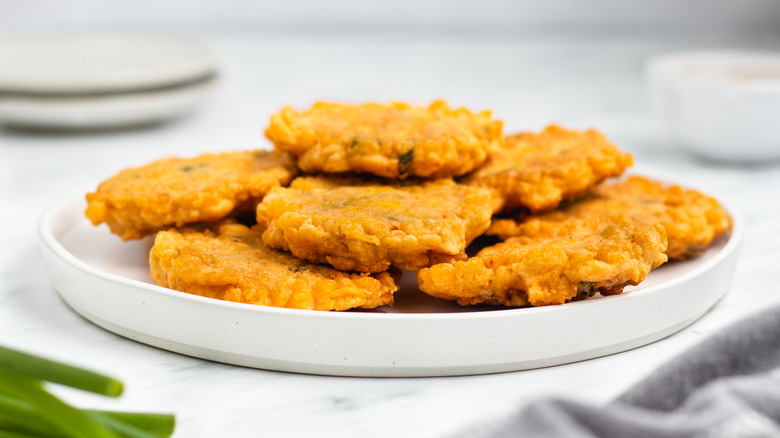 crispy corn fritters on plate 