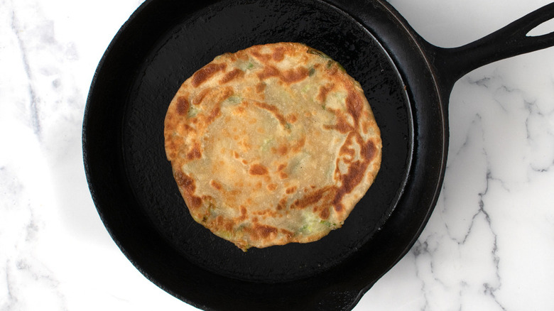 scallion pancake in skillet