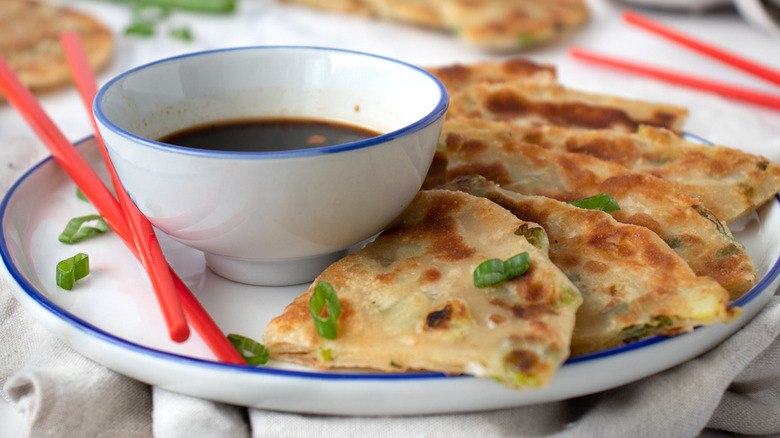 scallion pancake triangles with sauce