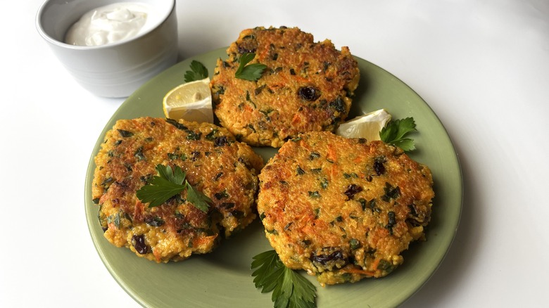 fried patties on green plate