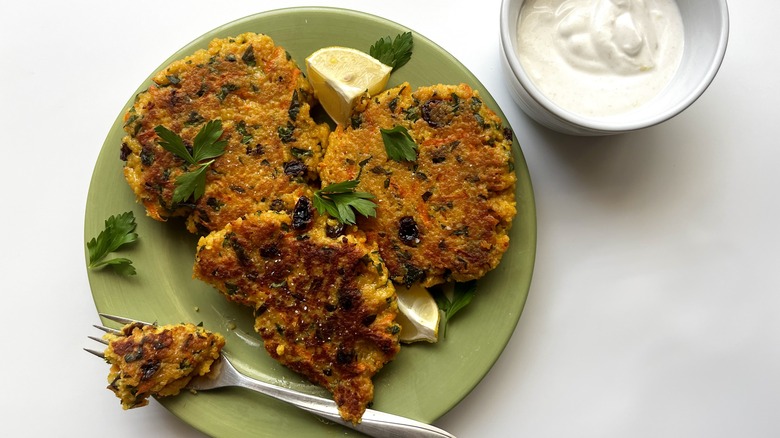 fried patties on green plate