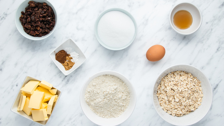 the ingredients for crispy oatmeal raisin cookies