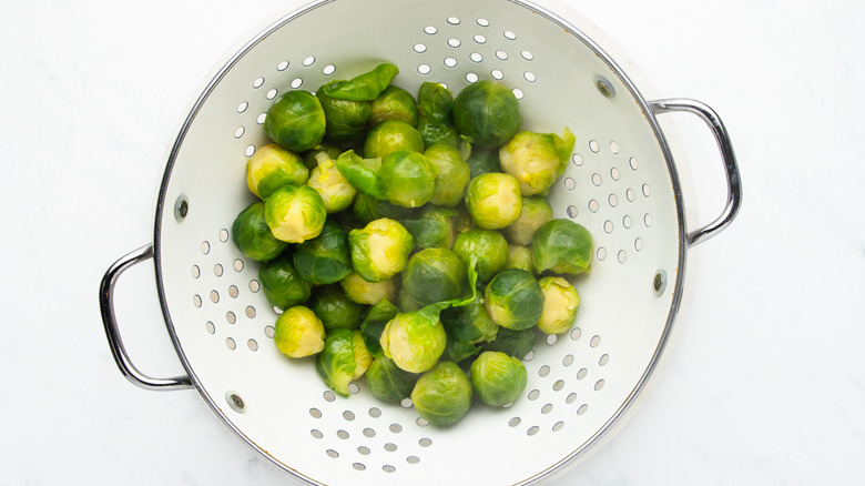 Brussels sprouts in a colander