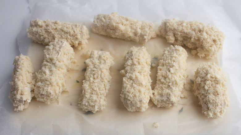 tofu nuggets breaded on baking sheet