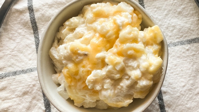 Bowl of funeral potatoes on cloth napkin