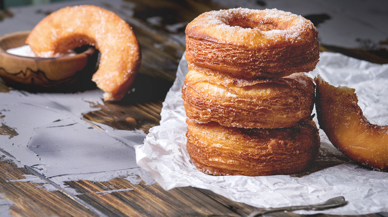 stacked cronuts with sugar