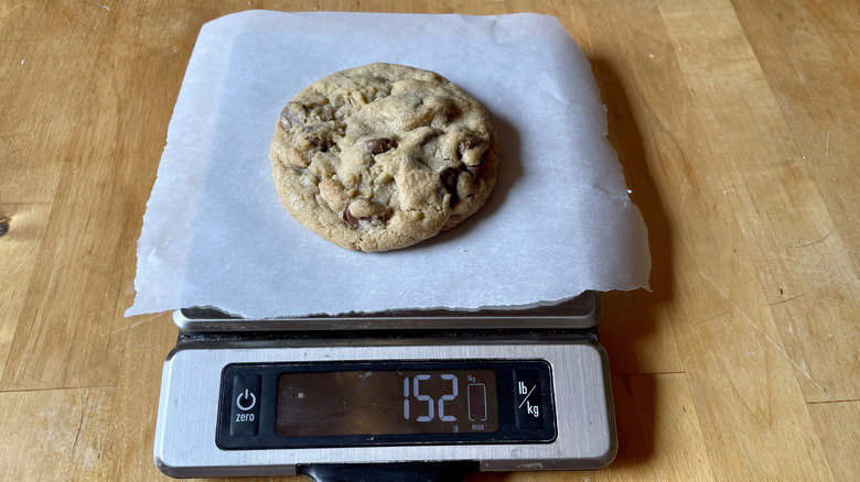 Chocolate chip cookie weighed on scale