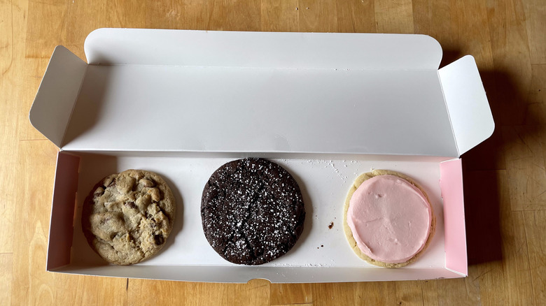 Box with three cookies in it