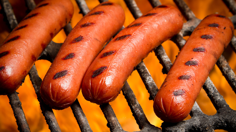 hot dogs on grill