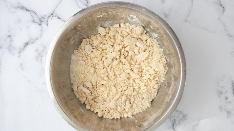 crumbly dough in bowl