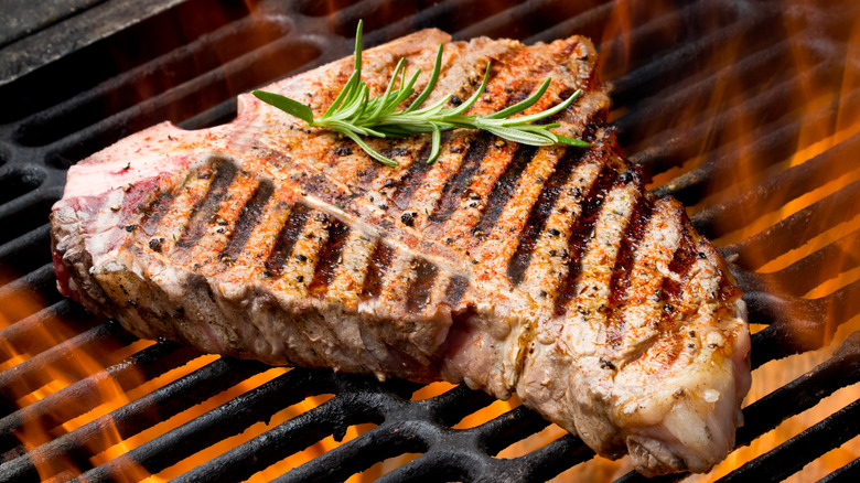 T-bone steak on grill