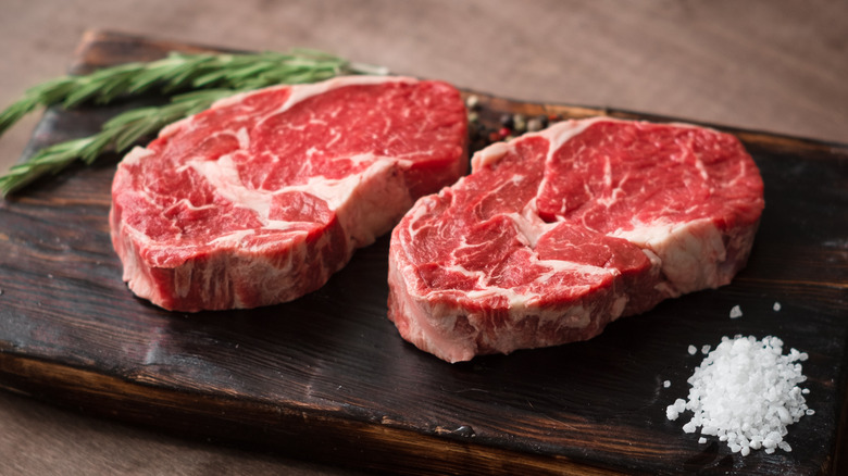 Ribeye steak on cutting board