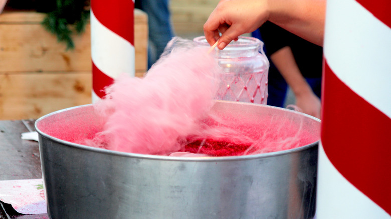 person making cotton candy