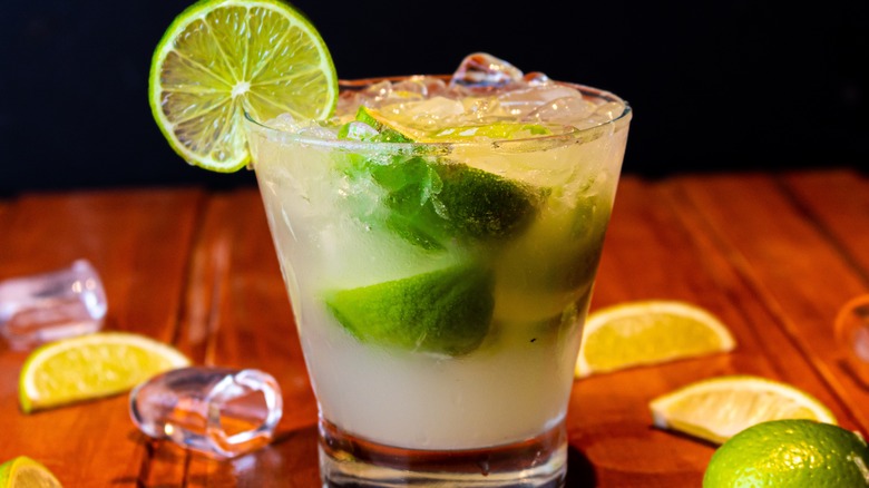 Caipirinha topped with a lime wheel