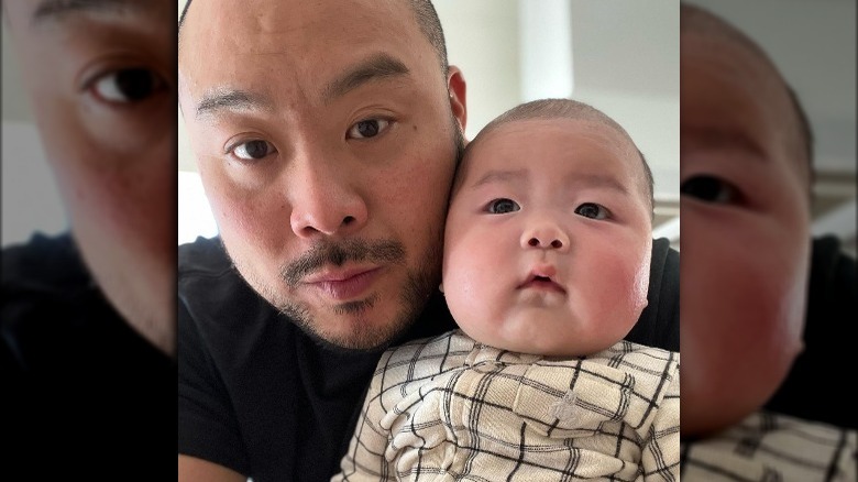 David Chang with baby son