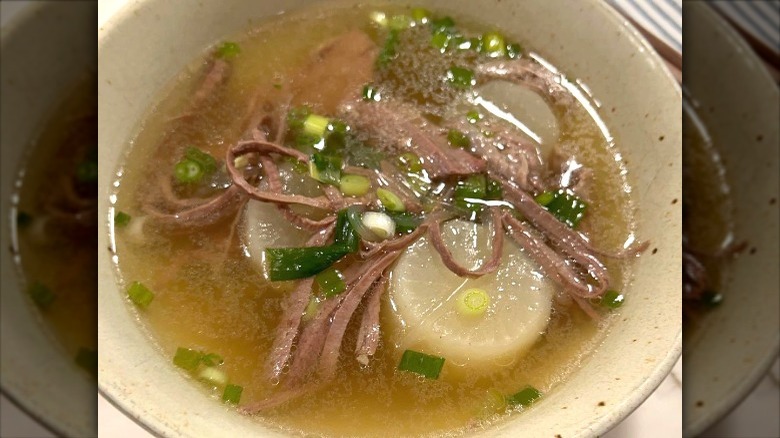 Soup with shredded beef brisket and daikon radishes