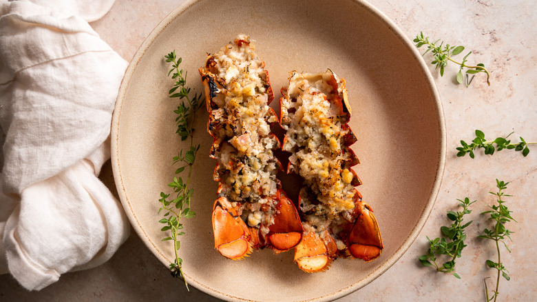 stuffed lobster tails on plate