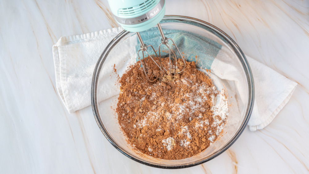 mixing dry ingredients for cupcakes