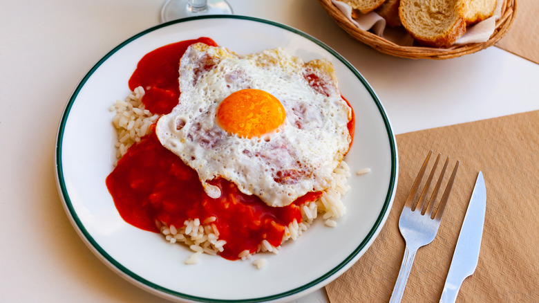 rice with sunny egg and tomato sauce